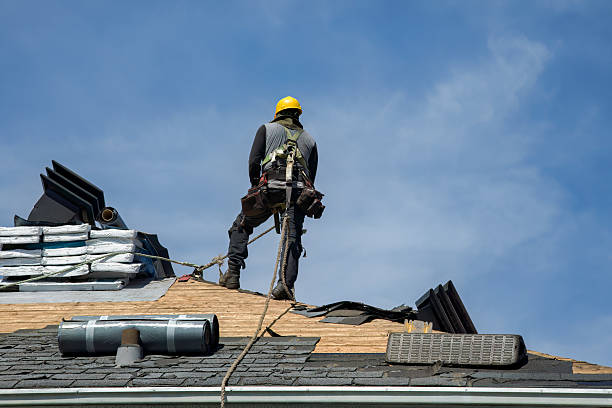 Professional Gutter Installation technician working in Summitville, TN